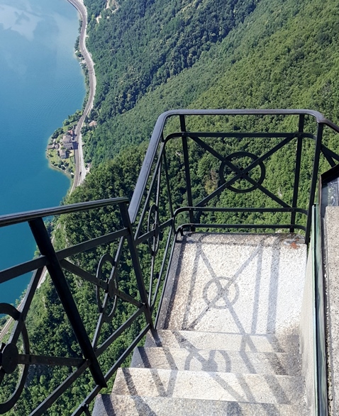 Church stairs looking straight down to Lake Lugano